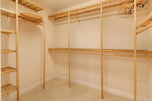 a bathroom that has a glass shower door