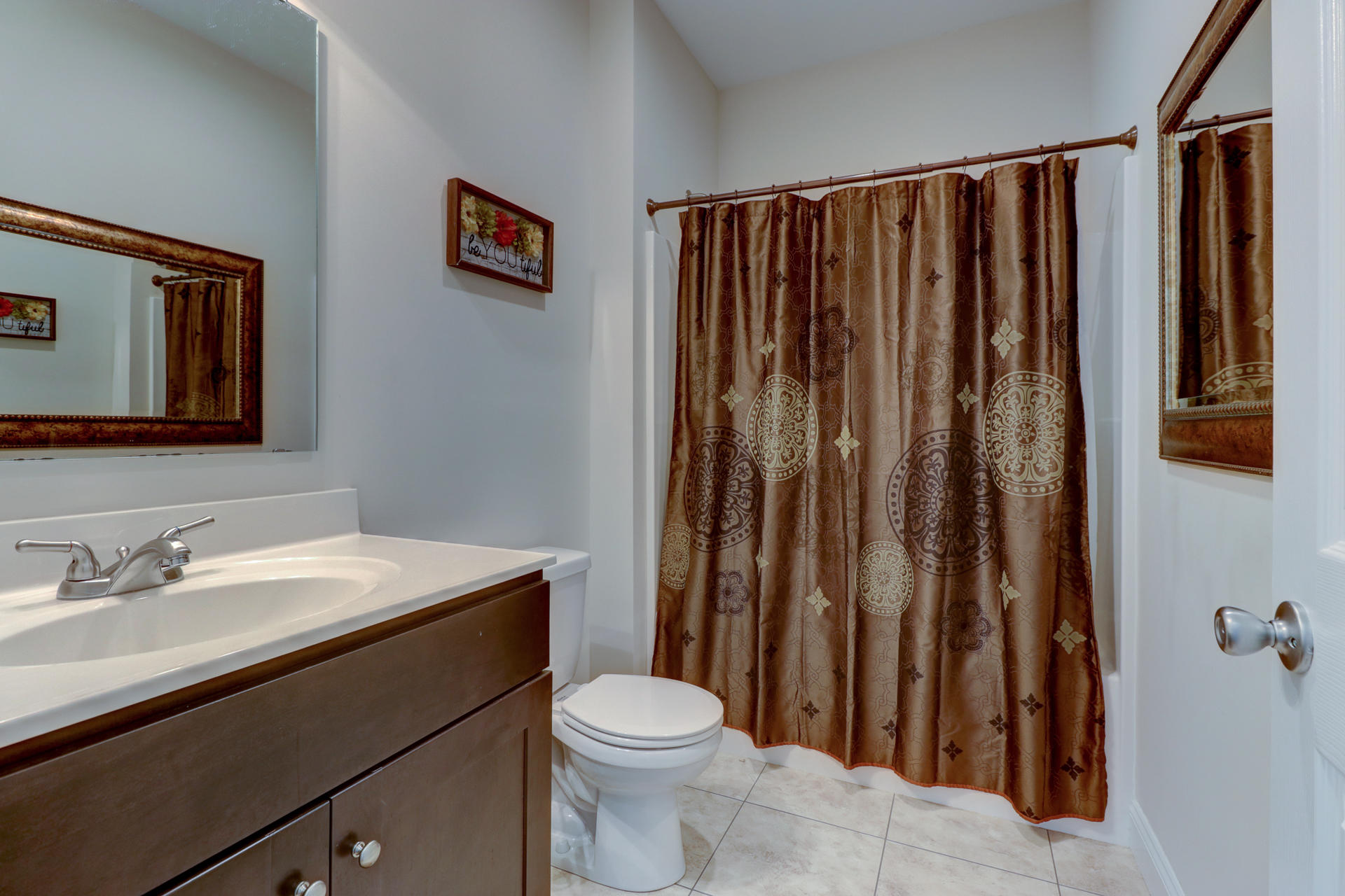 17 Silver Shadow Road Hardy, VA 24101 - Photo 19 of 31 a bathroom with a sink a toilet and shower curtain
