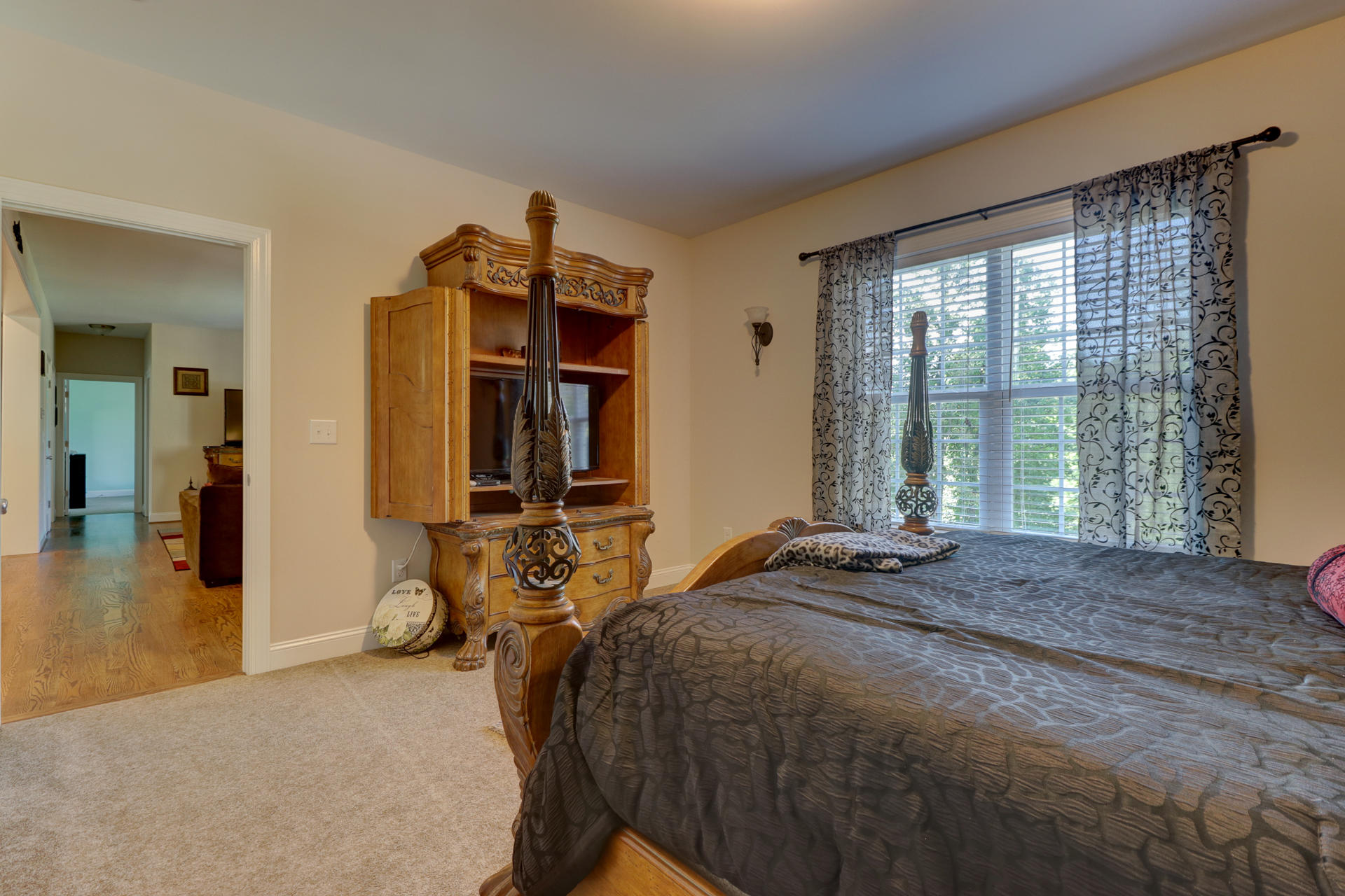 17 Silver Shadow Road Hardy, VA 24101 - Photo 26 of 31 a bedroom with a bed and large windows