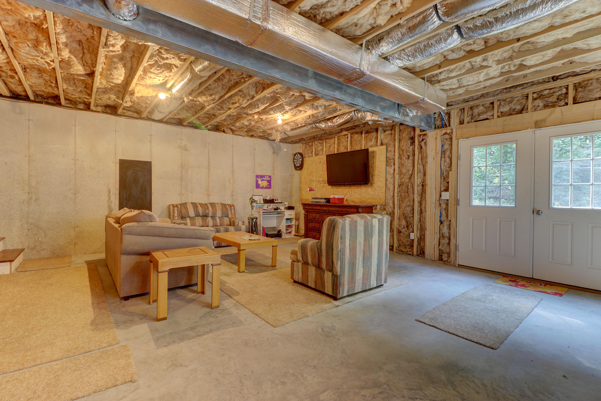 17 Silver Shadow Road Hardy, VA 24101 - Photo 27 of 31 a room with furniture and a flat screen tv