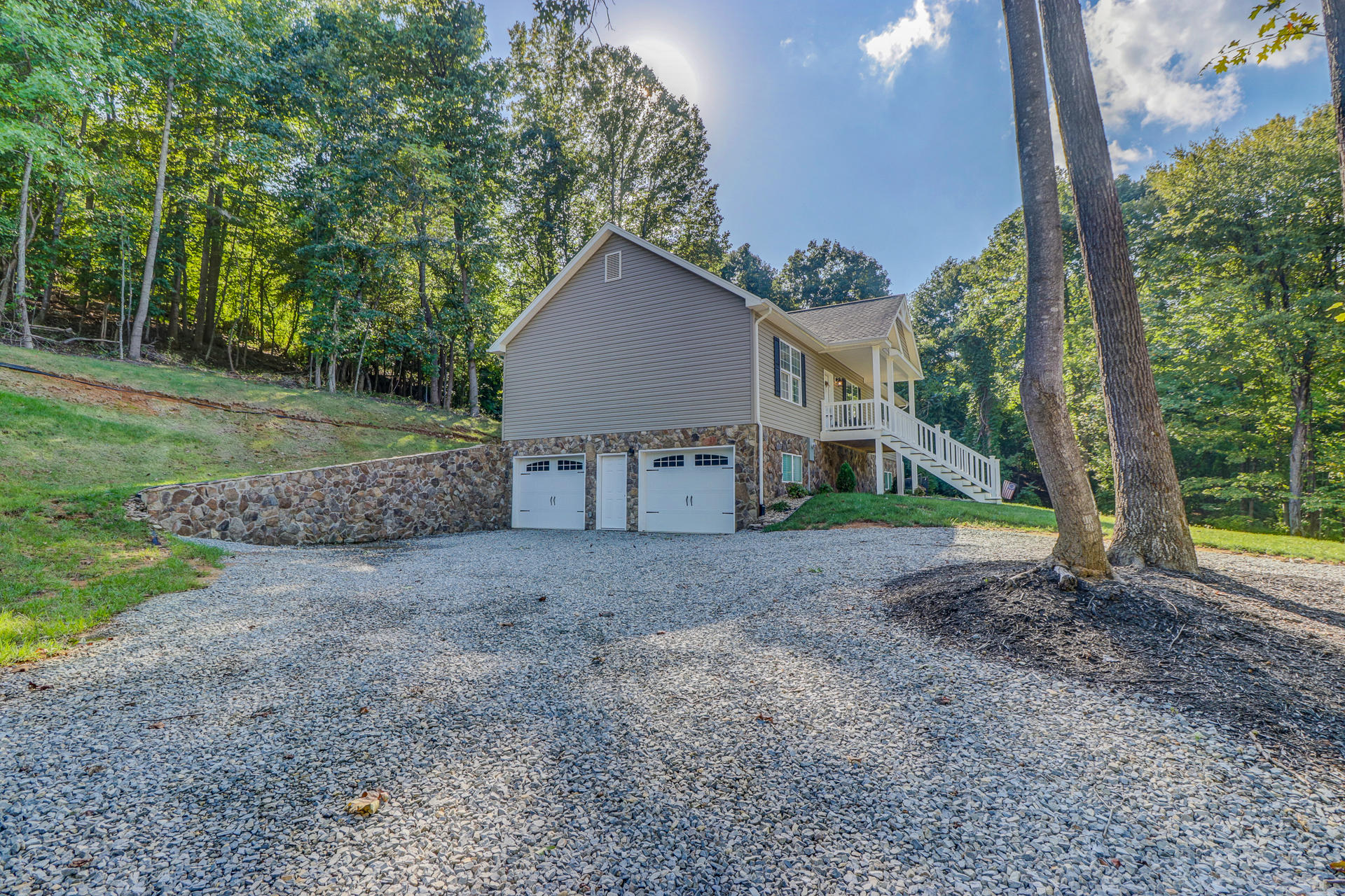 17 Silver Shadow Road Hardy, VA 24101 - Photo 30 of 31 a view of a house with a yard and large trees