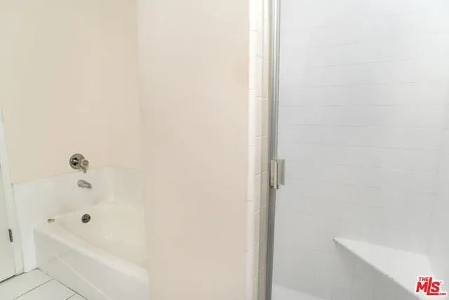 a view of a street with cars on road