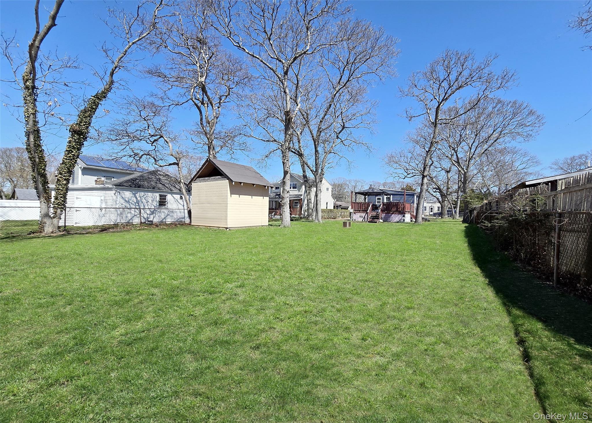 20 Daisy Place Selden, NY 11784 - Photo 11 of 13 a view of a house with a yard