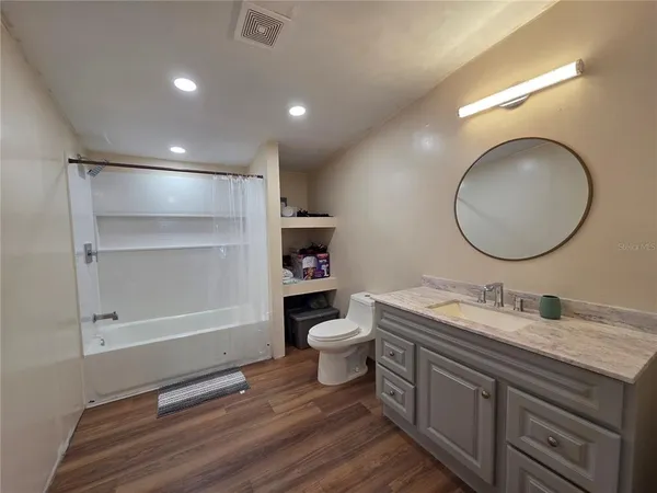 a living room with furniture and a couch