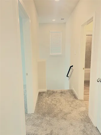 a view of a room with drop ceiling