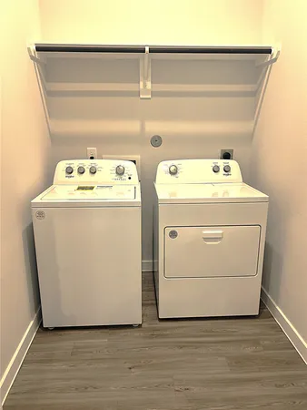 a utility room with dryer and washer
