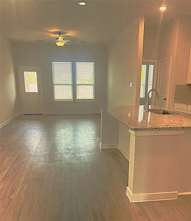 a view of kitchen and windows