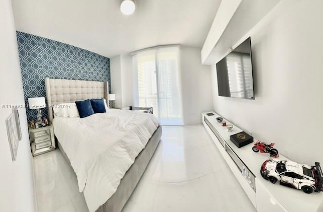 79 Southwest 12th Street, Unit 1806 Miami, FL 33130 - Photo 15 of 44 a bedroom with a bed and a dresser