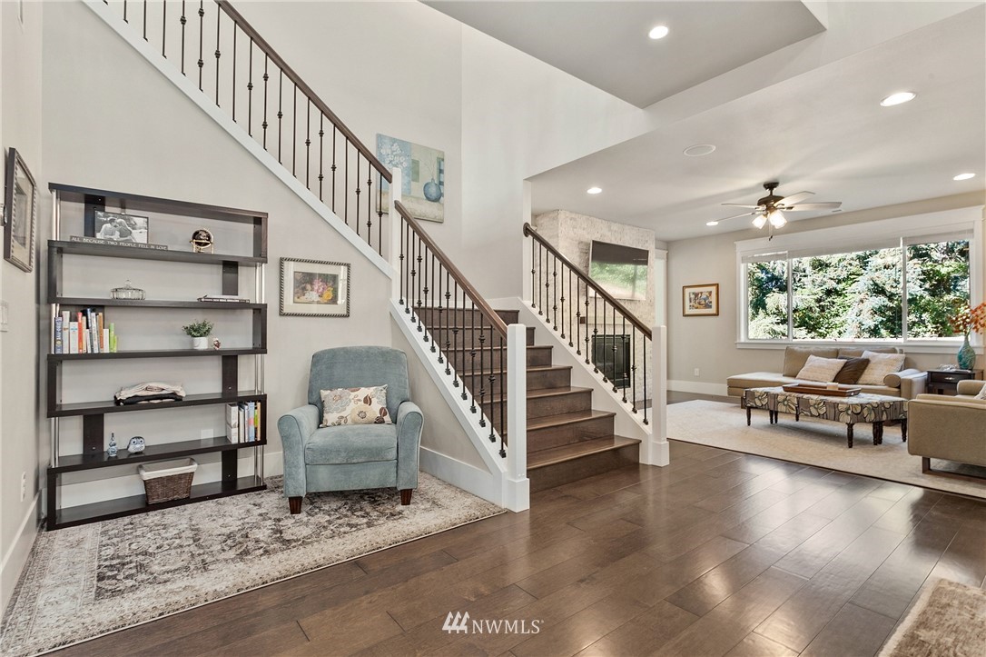 323 Field Place Southeast Renton, WA 98059 - Photo 12 of 40 a view of entryway and hall with wooden floor