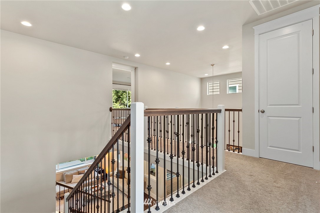 323 Field Place Southeast Renton, WA 98059 - Photo 18 of 40 a view of a hallway with stairs