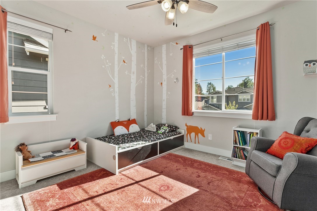 323 Field Place Southeast Renton, WA 98059 - Photo 31 of 40 a living room with furniture and a window