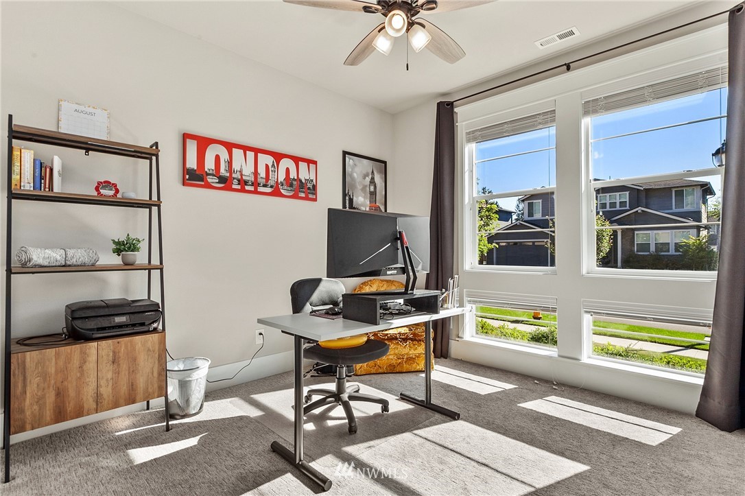 323 Field Place Southeast Renton, WA 98059 - Photo 33 of 40 a view of a workspace with furniture and a window