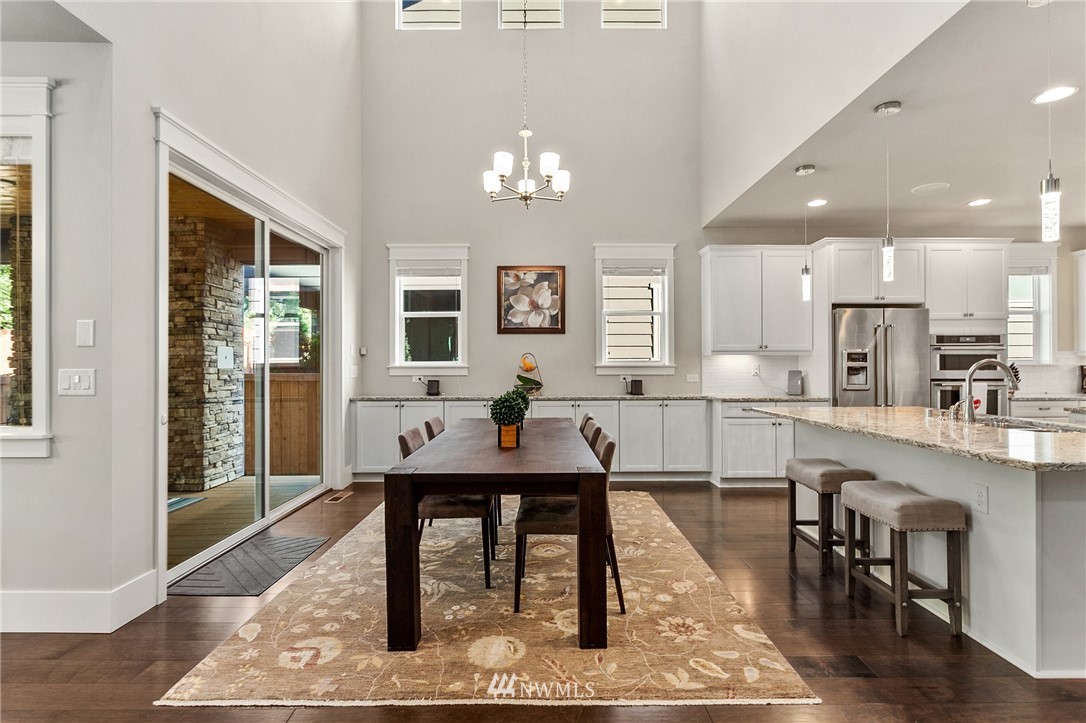 323 Field Place Southeast Renton, WA 98059 - Photo 7 of 40 a view of a dining room with furniture