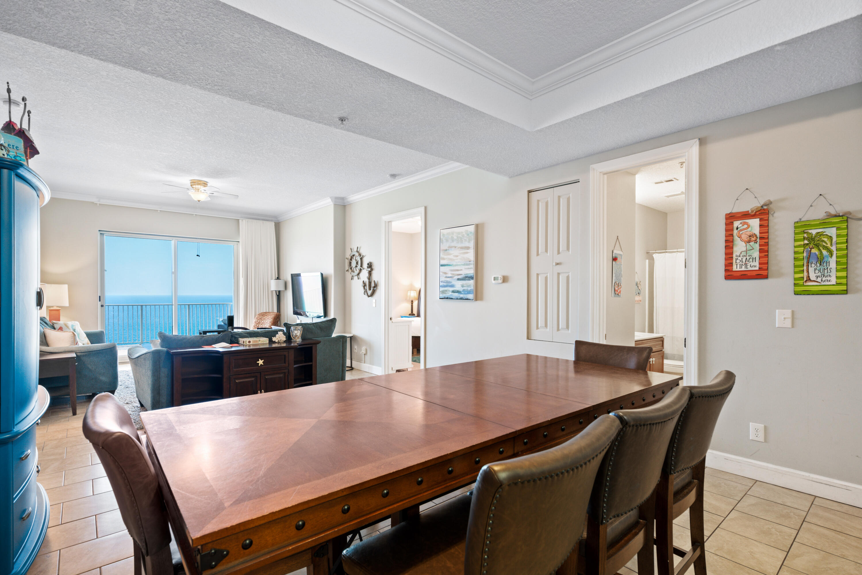 10611 Front Beach Road, Unit 2001 Panama City Beach, FL 32408 - Photo 13 of 49 a view of a dining room with furniture