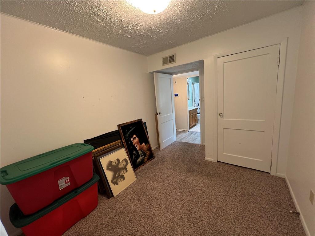 203 Carson Street Springdale, PA 15144 - Photo 21 of 43 a view of an empty room and storage