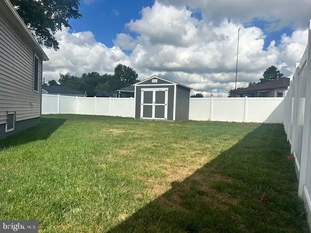 a view of a backyard with a garden