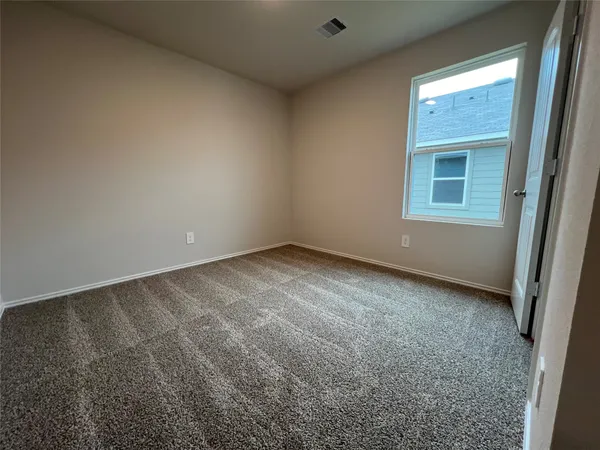 an empty room with closet