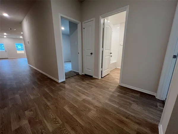 a bathroom with a toilet a sink and a mirror