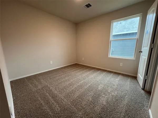 an empty room with closet