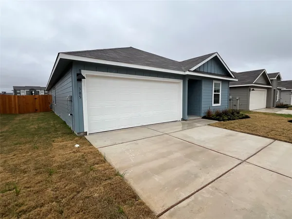 a fire hydrant in the middle of a field