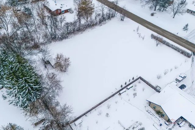 a view of wooden floor and a living room