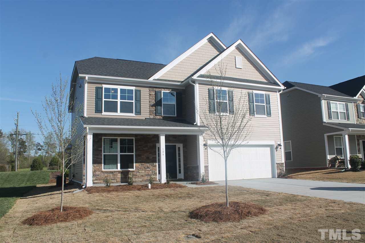 104 Hope Valley Road Knightdale, NC 27545 - Photo 1 of 15 a front view of a house with a yard