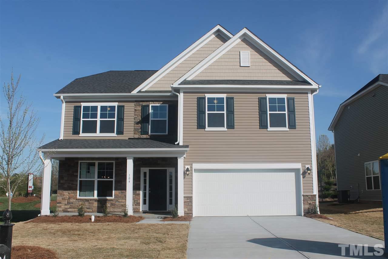 104 Hope Valley Road Knightdale, NC 27545 - Photo 2 of 15 a front view of a house with garden