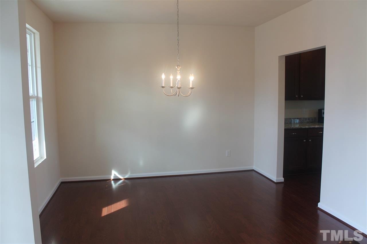 104 Hope Valley Road Knightdale, NC 27545 - Photo 5 of 15 a view of an empty room and window