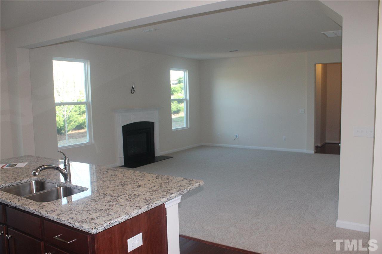 104 Hope Valley Road Knightdale, NC 27545 - Photo 6 of 15 a kitchen with granite countertop a sink and a granite counter tops