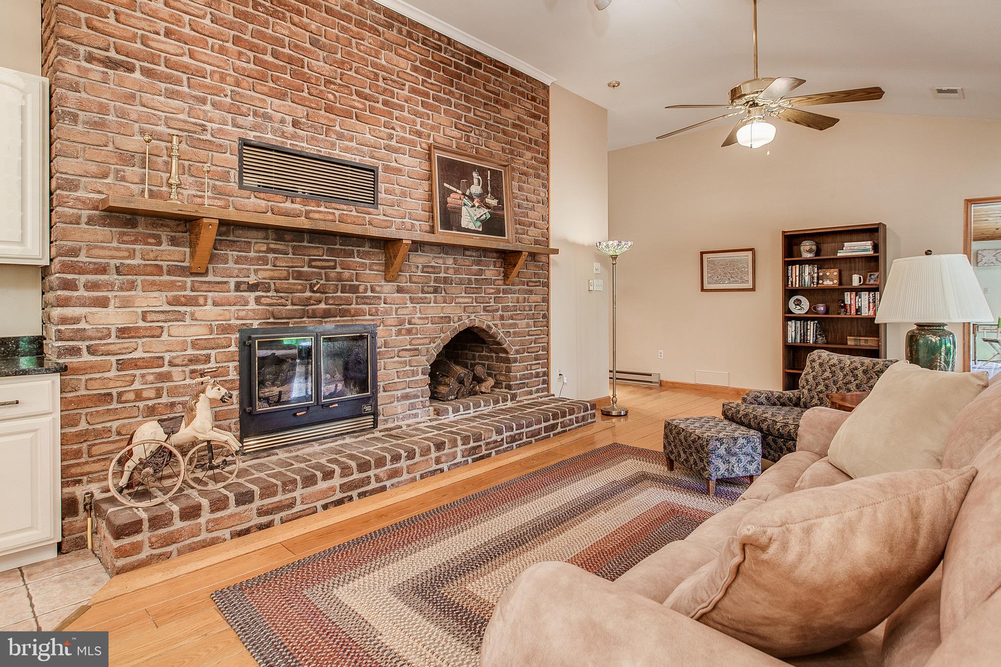 11896 Mountain Ash Road Clear Spring, MD 21722 - Photo 5 of 50 Two sided wood burning fireplace...