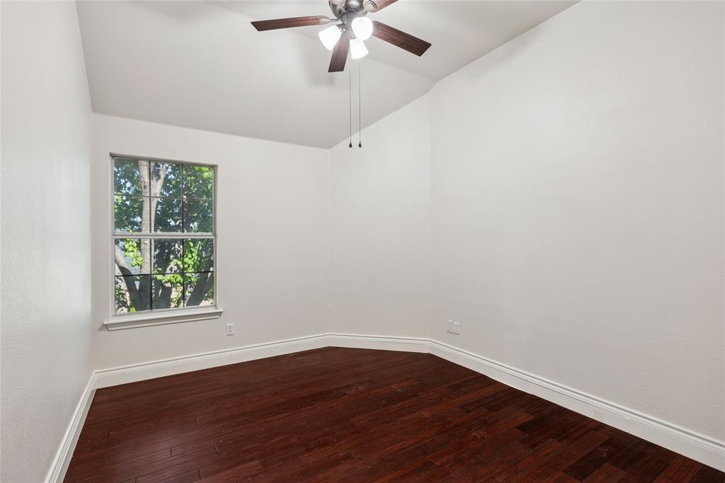 4509 Gila Bend Lane Fort Worth, TX 76137 - Photo 20 of 28 wooden floor in an empty room with a window