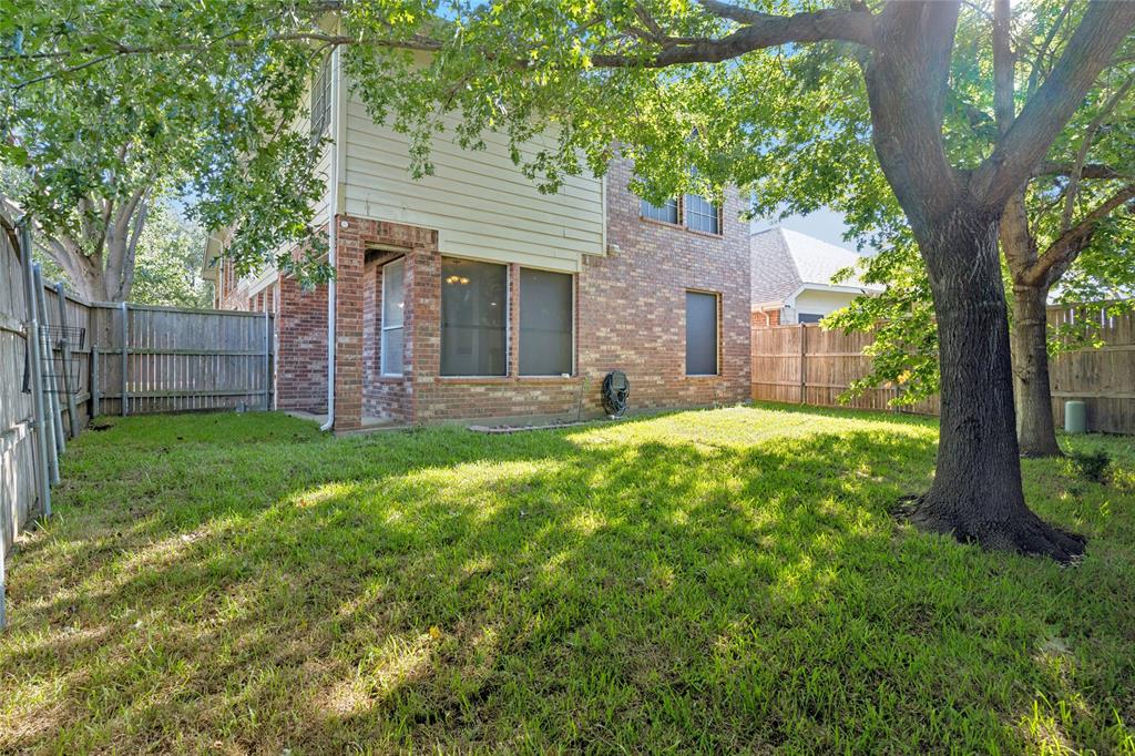 4509 Gila Bend Lane Fort Worth, TX 76137 - Photo 28 of 28 a view of a house with a yard