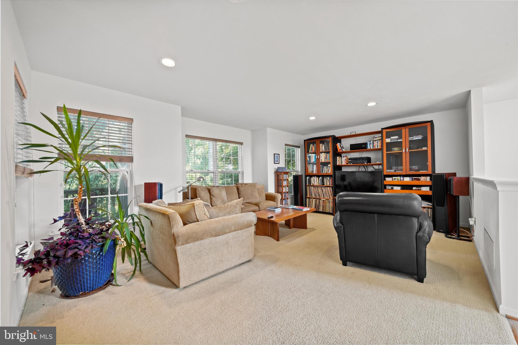 1015 Adams Way West Chester, PA 19382 - Photo 14 of 48 a living room with furniture and a potted plant