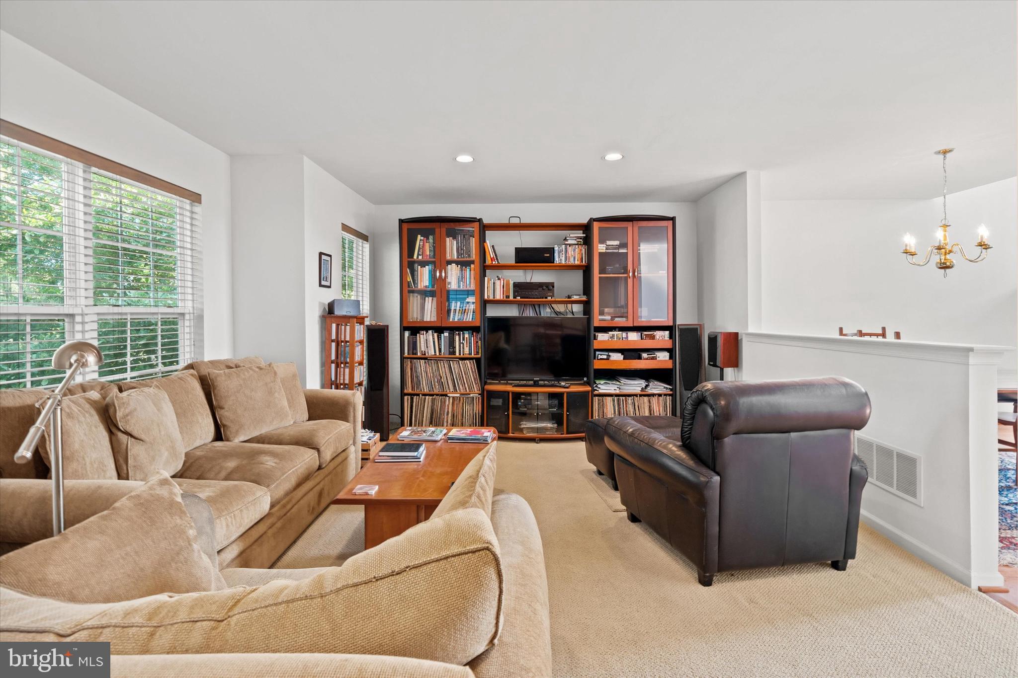 1015 Adams Way West Chester, PA 19382 - Photo 15 of 48 a living room with furniture and a large window