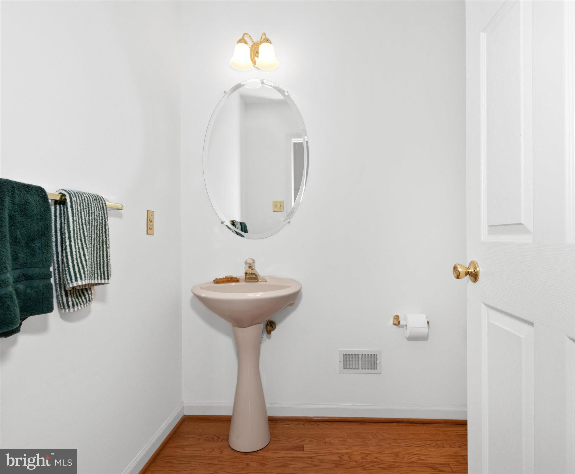 1015 Adams Way West Chester, PA 19382 - Photo 26 of 48 a bathroom with a sink and mirror