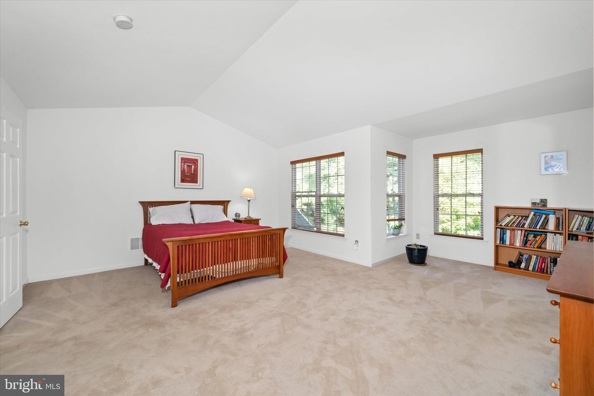 1015 Adams Way West Chester, PA 19382 - Photo 33 of 48 a bedroom with furniture and a book shelf