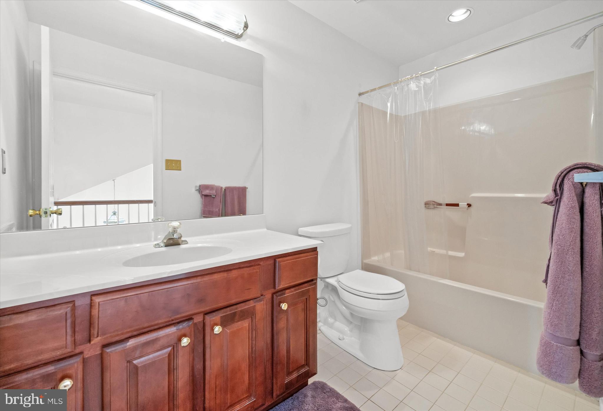 1015 Adams Way West Chester, PA 19382 - Photo 38 of 48 a bathroom with a sink a toilet and shower