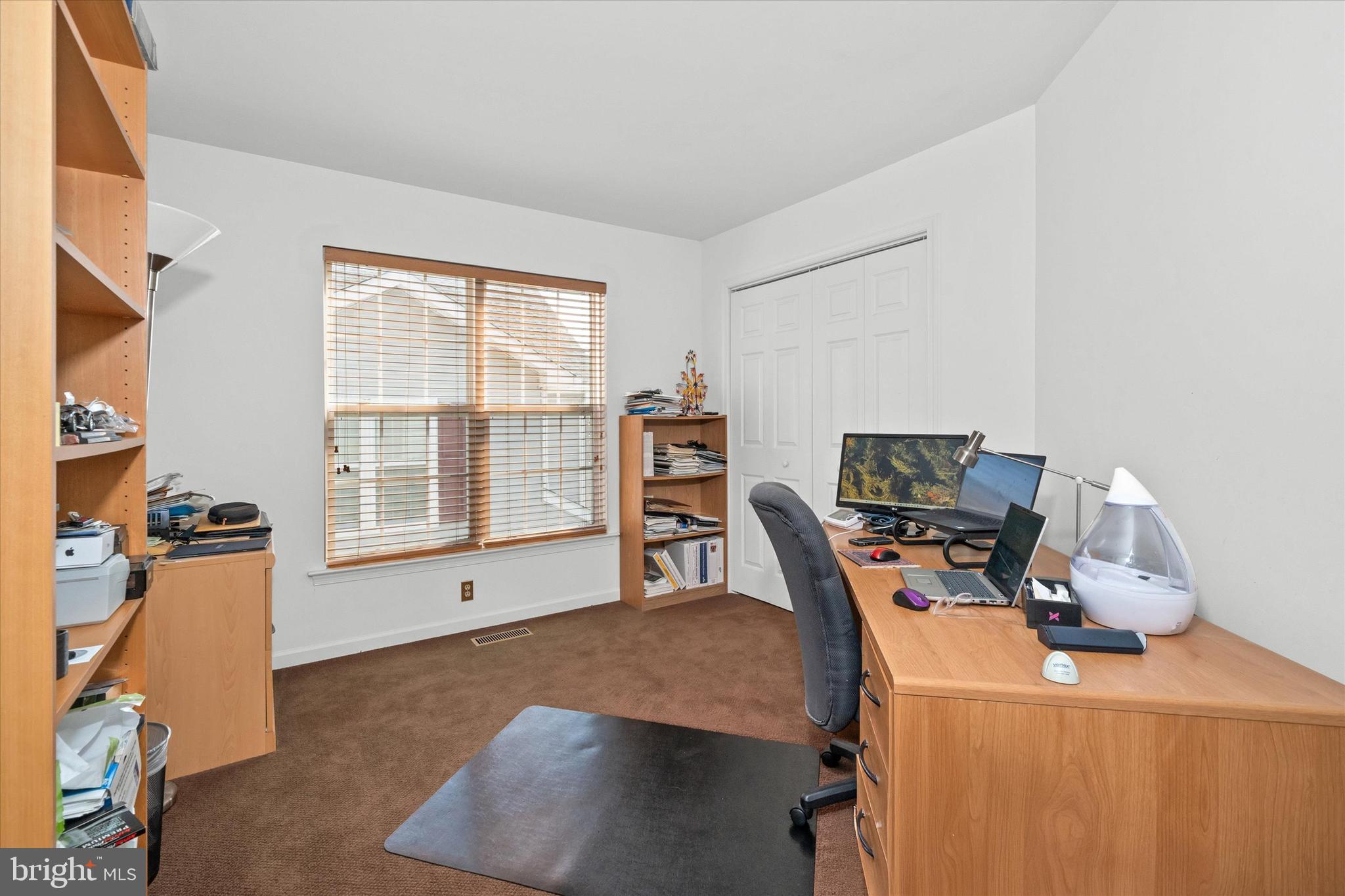 1015 Adams Way West Chester, PA 19382 - Photo 41 of 48 a view of a workspace with furniture and a window