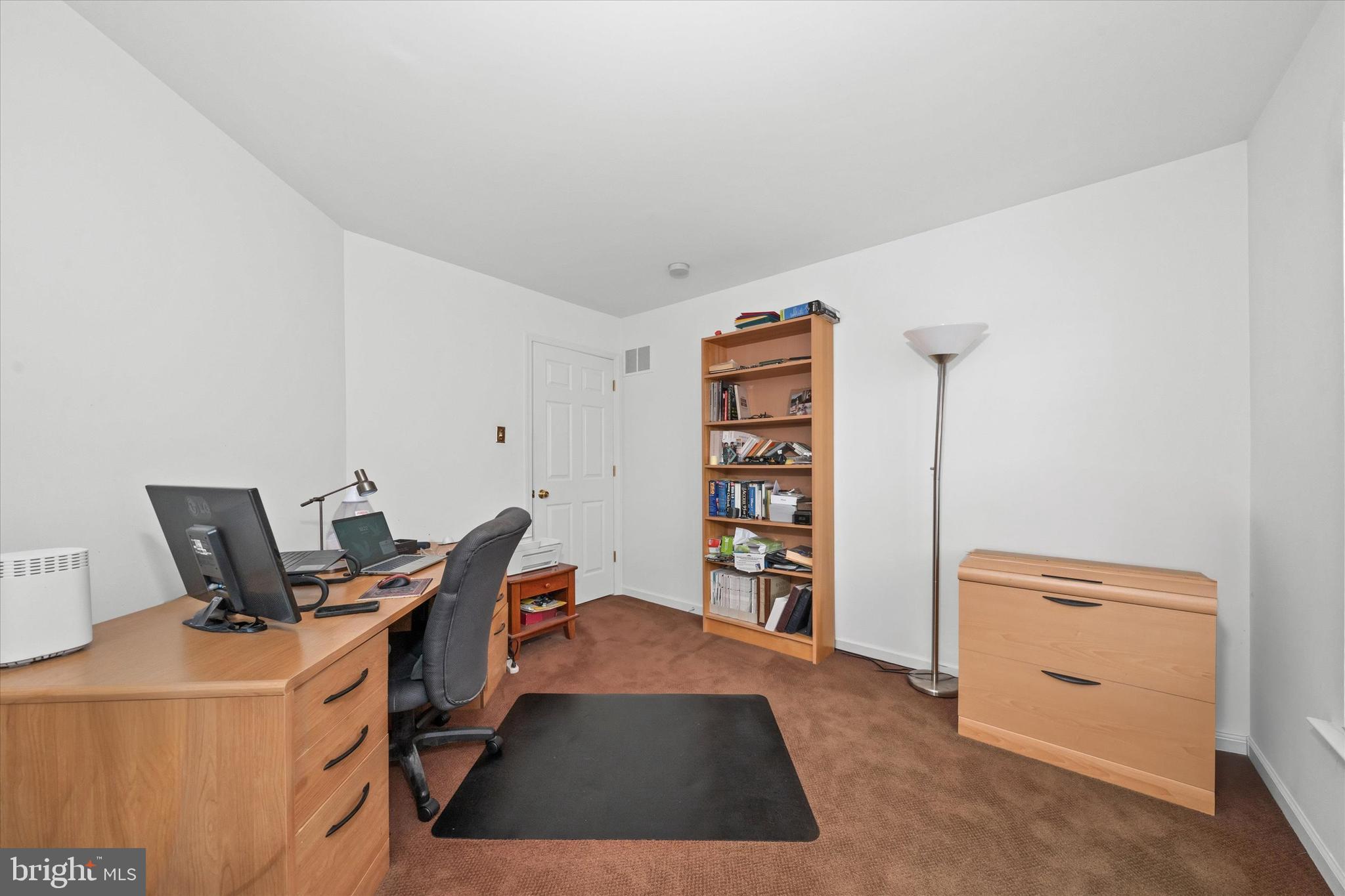 1015 Adams Way West Chester, PA 19382 - Photo 42 of 48 a room with furniture a air conditioner and a window