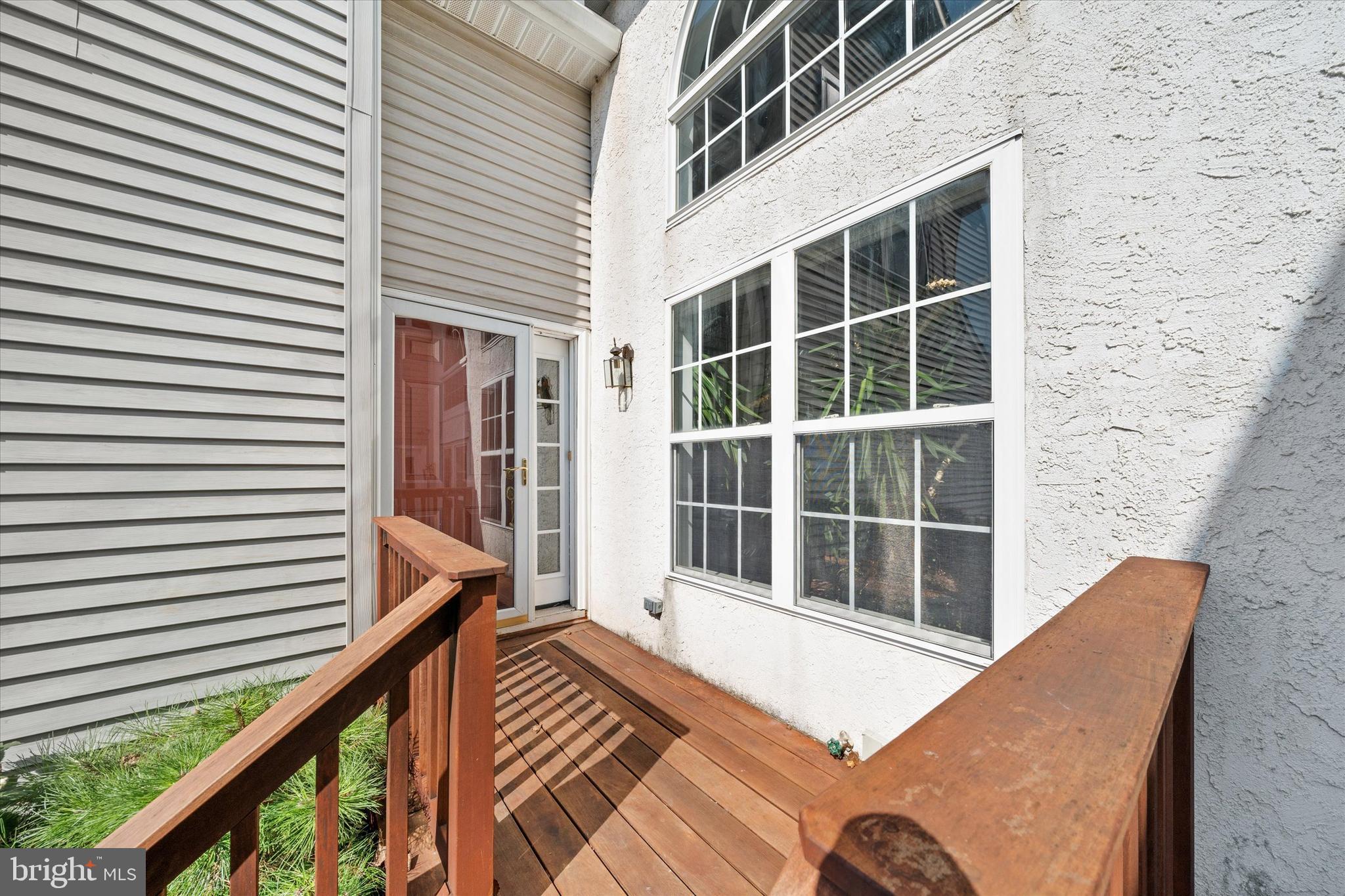 1015 Adams Way West Chester, PA 19382 - Photo 6 of 48 a view of balcony with wooden floor and fence