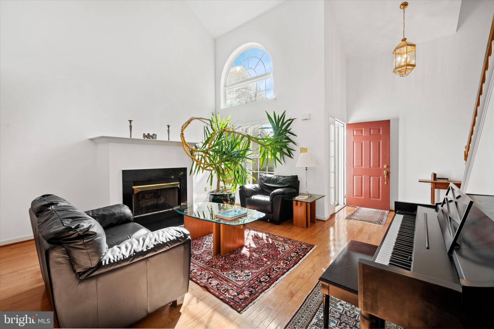 1015 Adams Way West Chester, PA 19382 - Photo 10 of 48 a living room with furniture and a fireplace