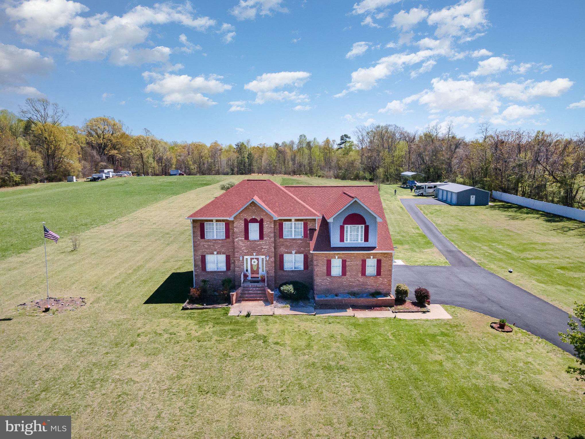 9121 Will Loop King George, VA 22485 - Photo 3 of 52 a view of a house with a yard
