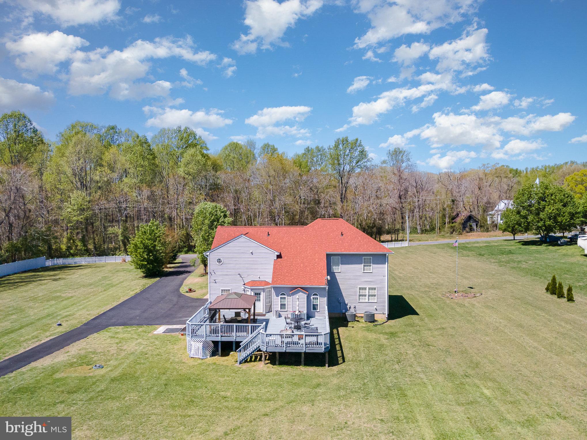 9121 Will Loop King George, VA 22485 - Photo 42 of 52 an aerial view of a house with garden space and trees