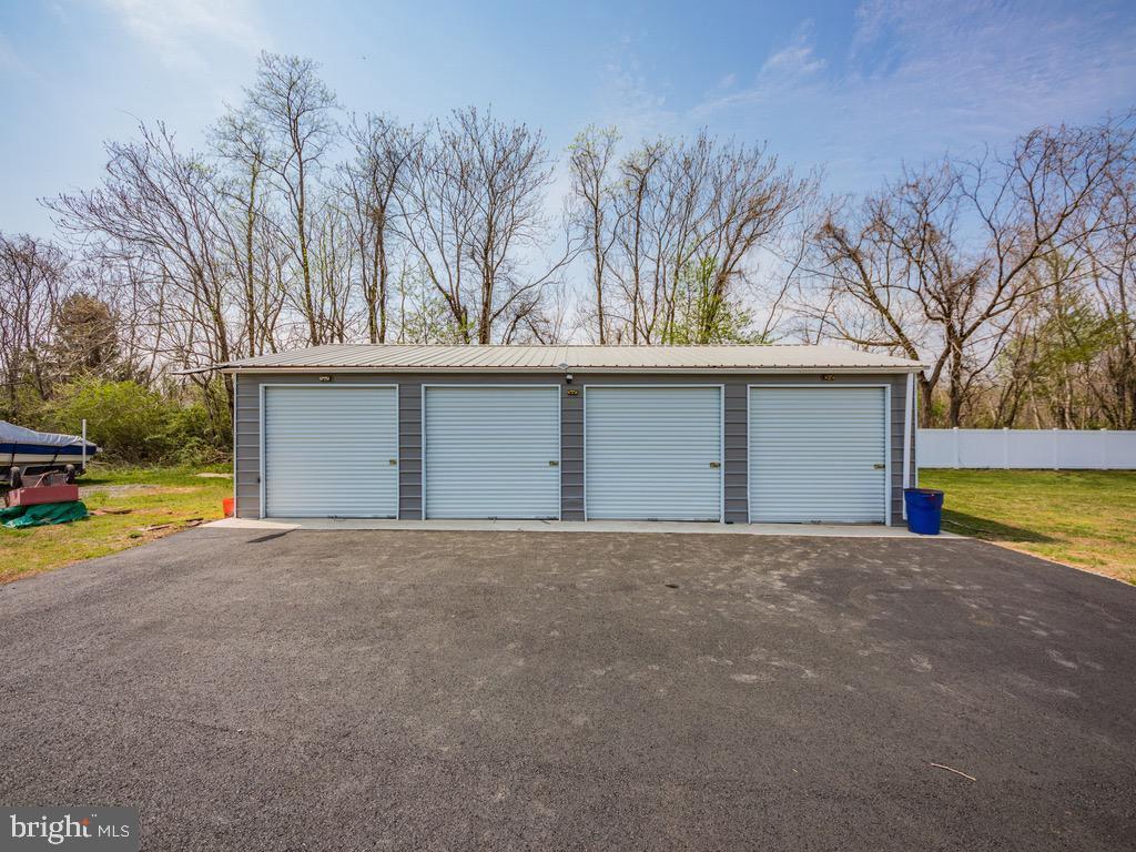 9121 Will Loop King George, VA 22485 - Photo 51 of 52 a view of outdoor space with yard and tree in beside