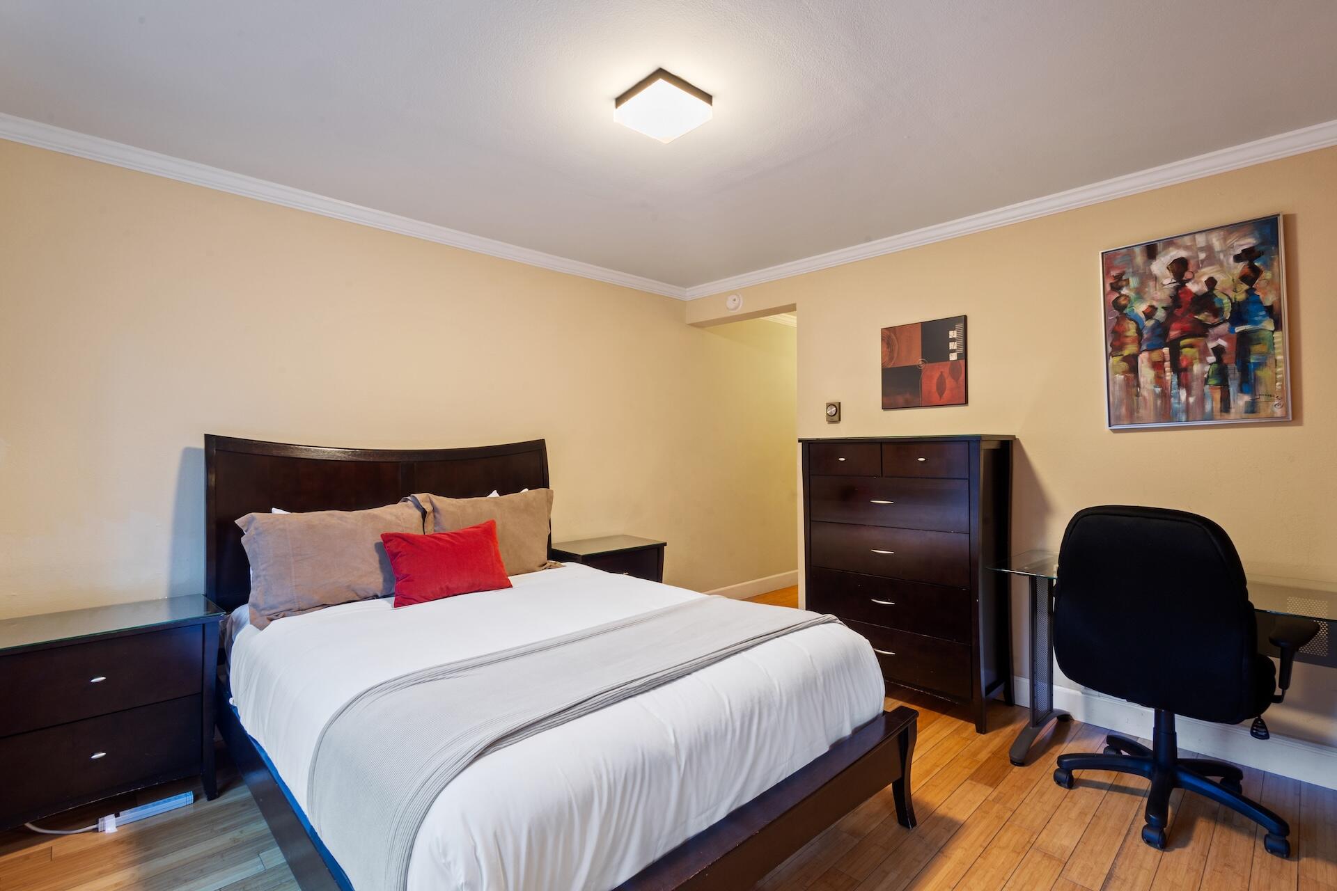 260 South Aspen Street, Unit D 2 Telluride, CO 81435 - Photo 22 of 30 a bedroom with a bed and wooden floor