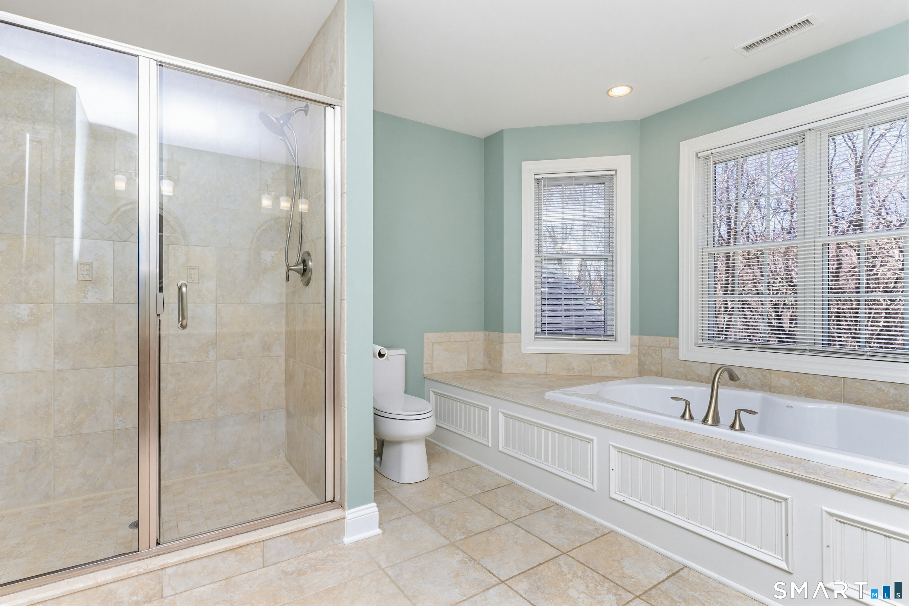 30 Block Farm Road Monroe, CT 06468 - Photo 26 of 40 a spacious bathroom with a shower bathtub and a sink