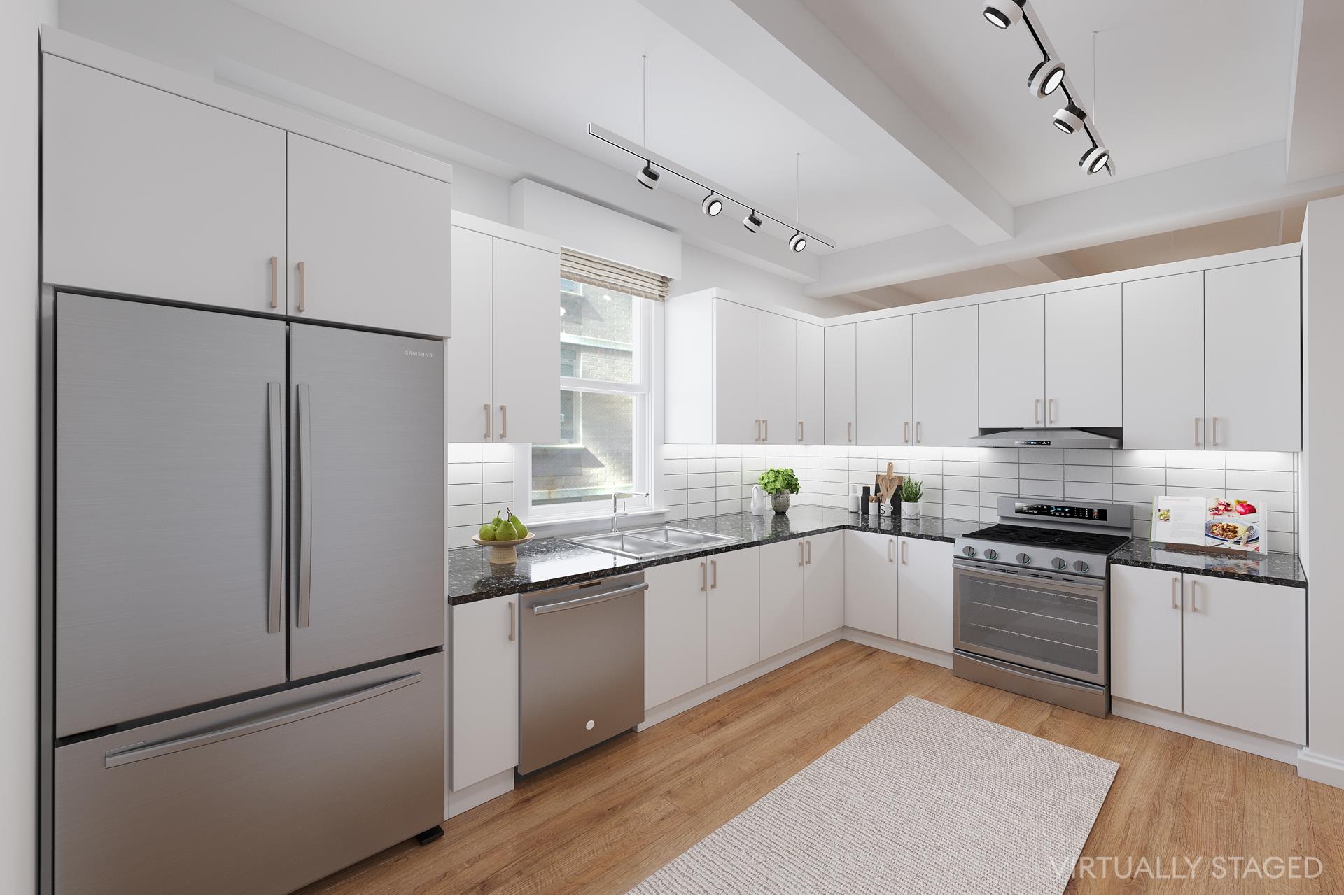 227 West 17th Street, Unit 3 Manhattan, NY 10011 - Photo 5 of 26 a kitchen with stainless steel appliances granite countertop a refrigerator a sink a stove and white cabinets