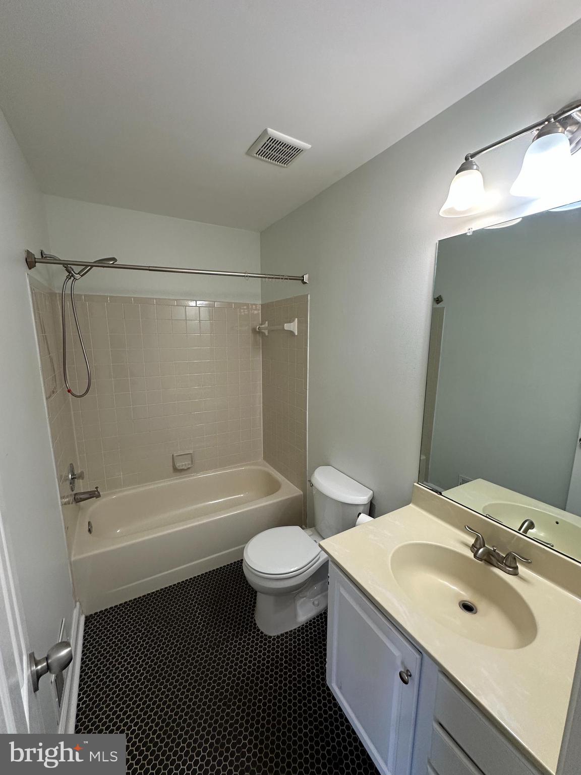 7 Drumcastle Court Germantown, MD 20876 - Photo 11 of 17 a bathroom with a sink a toilet and a bathtub