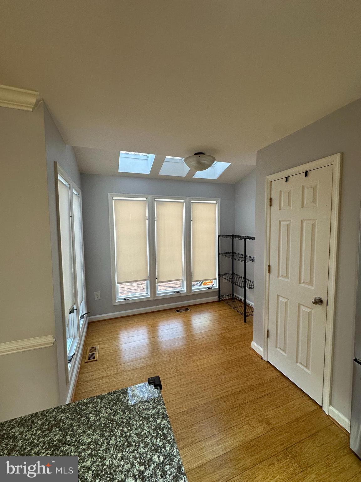 7 Drumcastle Court Germantown, MD 20876 - Photo 4 of 17 a view of a livingroom with wooden floor