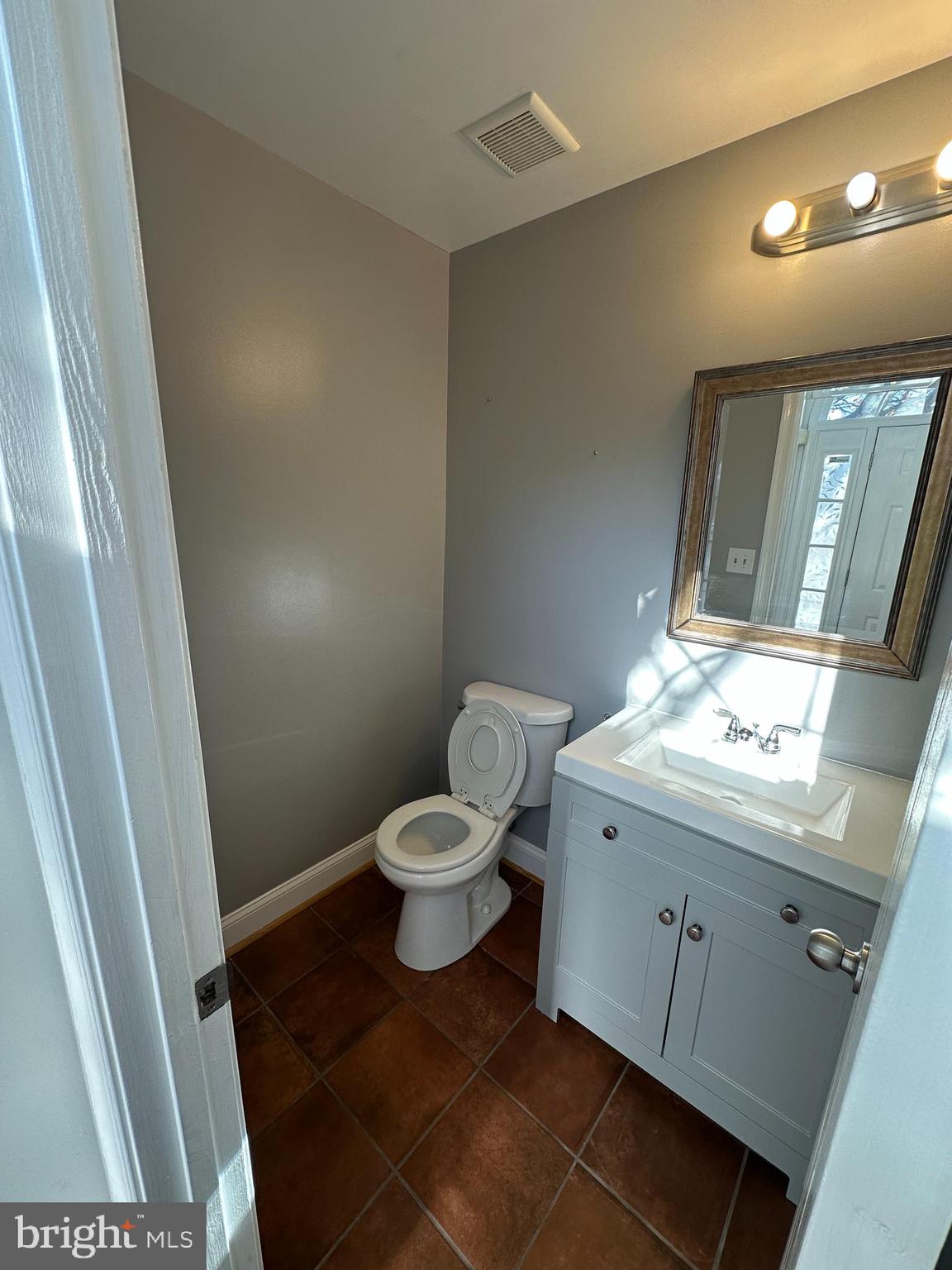 7 Drumcastle Court Germantown, MD 20876 - Photo 6 of 17 a bathroom with a sink and a toilet